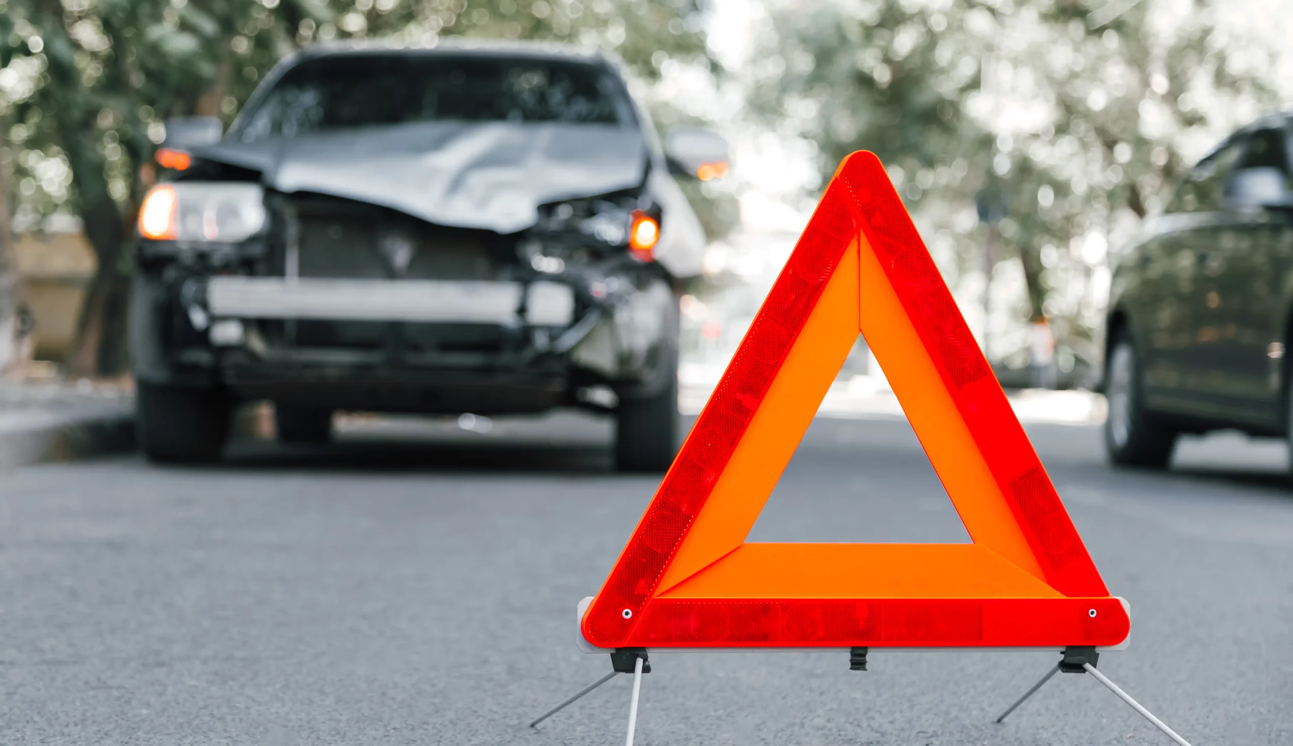 car crash with emergency stop triangle sign in Cincinnati