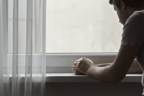 Victim of the Maryland Catholic Church Sexual Abuse claims at a window.