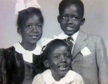 Johnnie Cochran as a young child with his 2 sisters